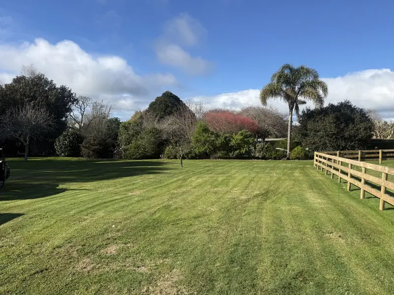 Large fenced property lawn mowed by JR Lawn Mowing